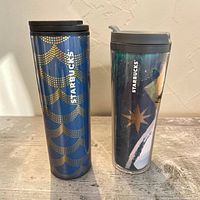 Front view of both tumblers standing upright