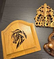 Both wooden plaques side by side on tabletop