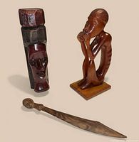 Group shot of two statues and letter opener