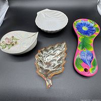 All four small dishes arranged for size and style reference