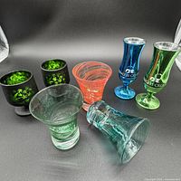 Group view of all seven shot glasses