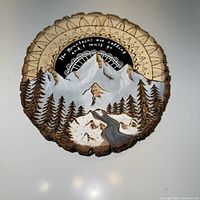 Front view showing full painted scene and quote