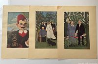 Three Rousseau prints side by side on flat surface