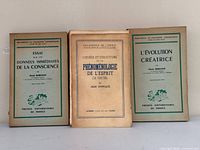 Front covers of the three paperback books