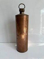 front view of cylindrical copper hot water bottle