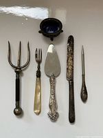 group shot of all seven sterling pieces