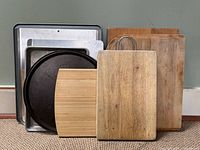 group shot of all boards and pans upright against wall