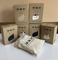 Six boxed Envirosax bags with one folded bag in front