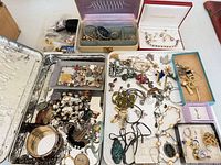 Overview of trays and boxes showing entire jewelry lot