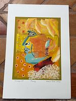 Full view of the monoprint on backing showing overall artwork and border