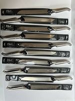 Ten packaged Füri Pro bread knives laid out