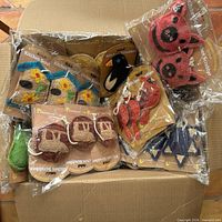 open box showing various packaged loofah scrubbers
