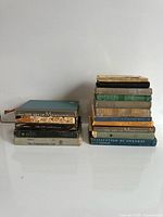 Two stacks of Goldsmith books showing quantity and varying sizes