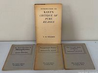Front view of all four philosophy books