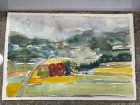 Full view of unframed watercolour landscape painting