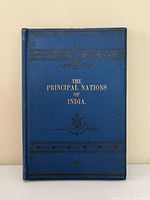 Front cover showing title and decorative blue cloth binding