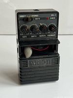 Front view showing knobs, labels, and battery compartment