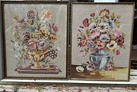 Both framed needlepoint pictures side by side