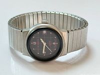 Front view of watch showing dial, case and bracelet