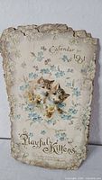 Front of 1901 Playful Kittens calendar showing title and kitten illustration