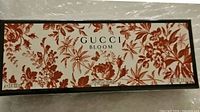 Front of boxed Gucci Bloom perfumed soap set