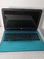 Laptop open showing screen and keyboard