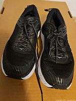 Shoes angled front view showing toe boxes, laces, overall condition