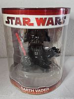 Front view of packaged Darth Vader bobble head