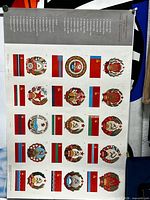 Full view of poster showing all flags and emblems