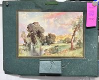 Front view showing lithograph, backing and folded calendar pad