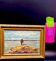 Frontal view of framed miniature landscape oil painting