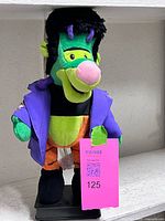 Front view of Frankenstein Goofy plush on base showing overall appearance
