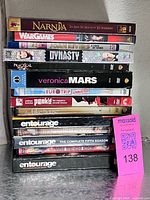 Stack of all DVDs showing titles and spine details