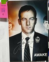 Full poster showing Jason Isaacs portrait, autograph visible