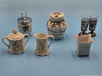 Full group showing all seven dining ware items