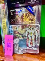 Front view of packaged Striker Eureka figure and comic