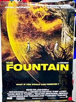 Full view of The Fountain poster pinned for size and design reference
