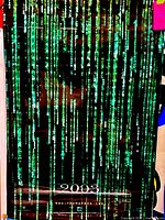 Full view of the poster showing code rain design and 2003 text