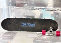 Tony Hawk skateboard deck topside with logo