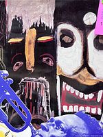 Close-up upper section showing tribal mask artwork