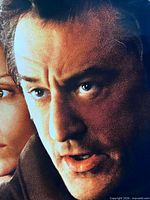 Close-up of Robert De Niro portrait section of poster