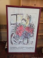 Full view of framed Chagall exhibition poster showing artwork and textual details