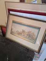 Front view of framed house picture showing artwork, matting and frame