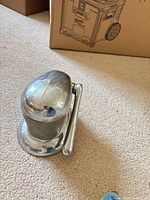 Overall view of chrome manual juicer with lever