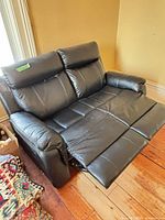 Loveseat with both footrests extended