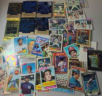 Overall view showing baseball cards spread out with Marvel mini-boxes and foil pack