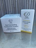 Front view of both boxed skincare items