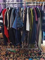 Full view of rack with assorted men’s tops