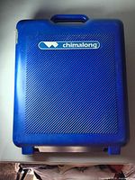 Closed blue Chimalong carrying case front view