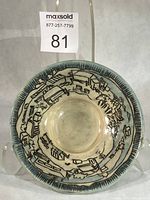 Full view of bowl showing interior decoration and rim
